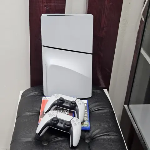 Sony PlayStation 5 Slim + 2 Controllers + 2 Games